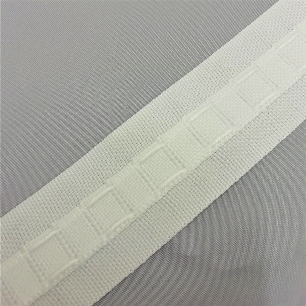 close up showing the drawcords and hook pockets of 28mm 1 inch curtain tape