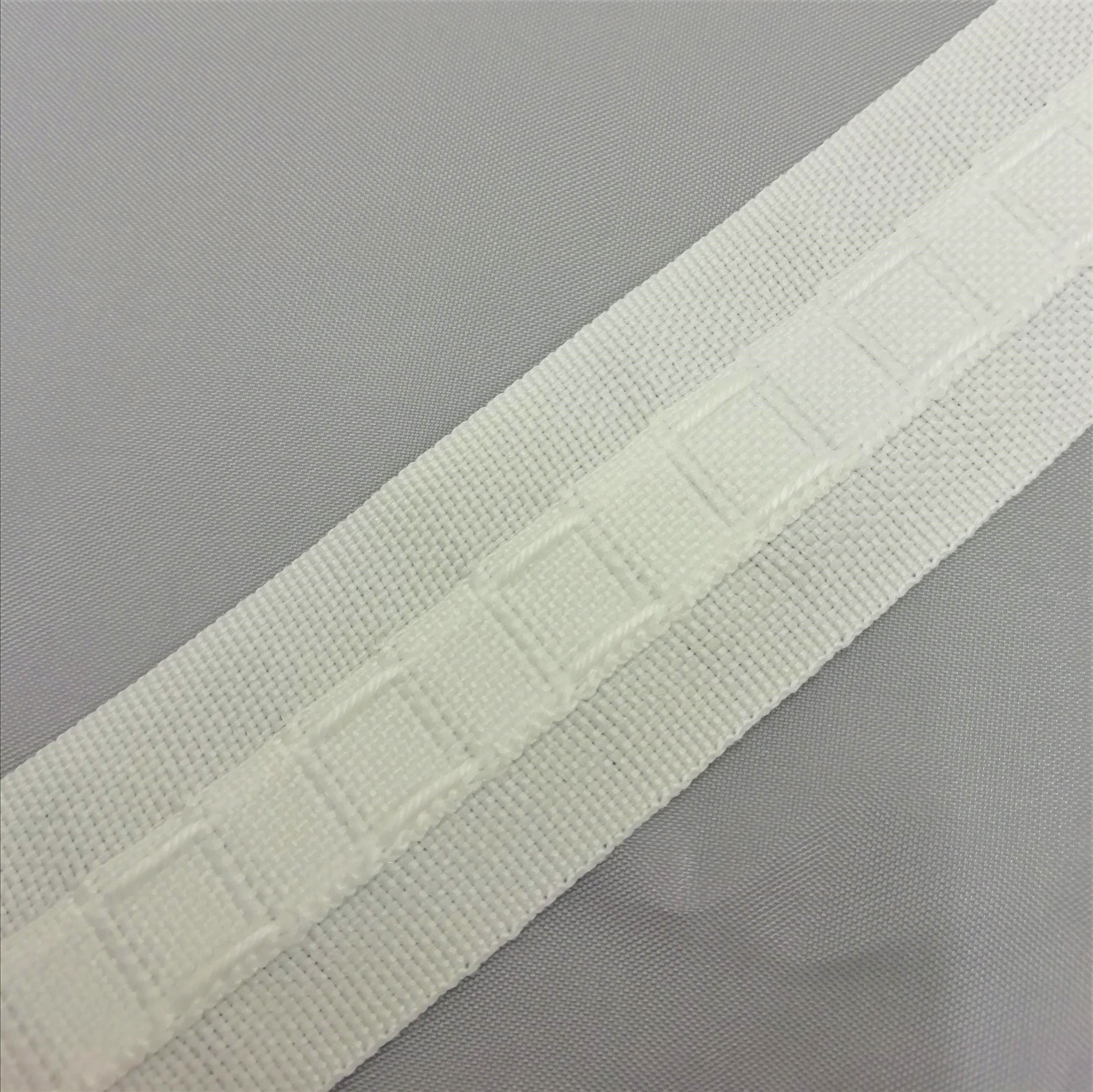 close up showing the drawcords and hook pockets of 28mm 1 inch curtain tape