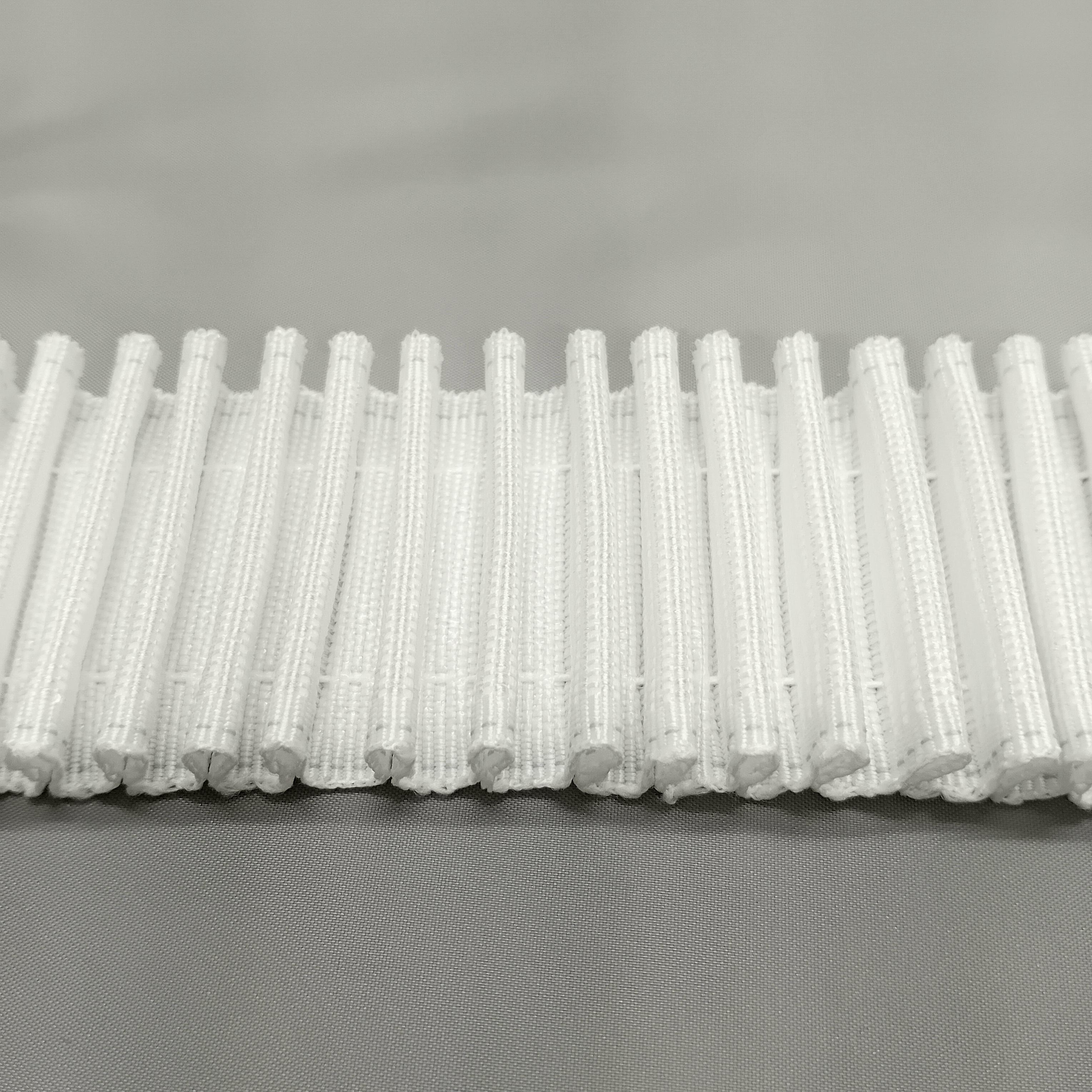 close up showing the pleats on 2 inch hook compatible curtain tape