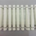 A close up of pencil pleat heading tape