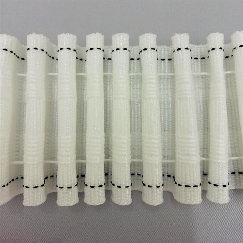 A close up of pencil pleat heading tape