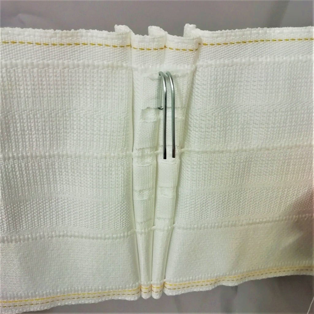 close up showing the curtain hook position on 6 inch pinch pleat curtain tape