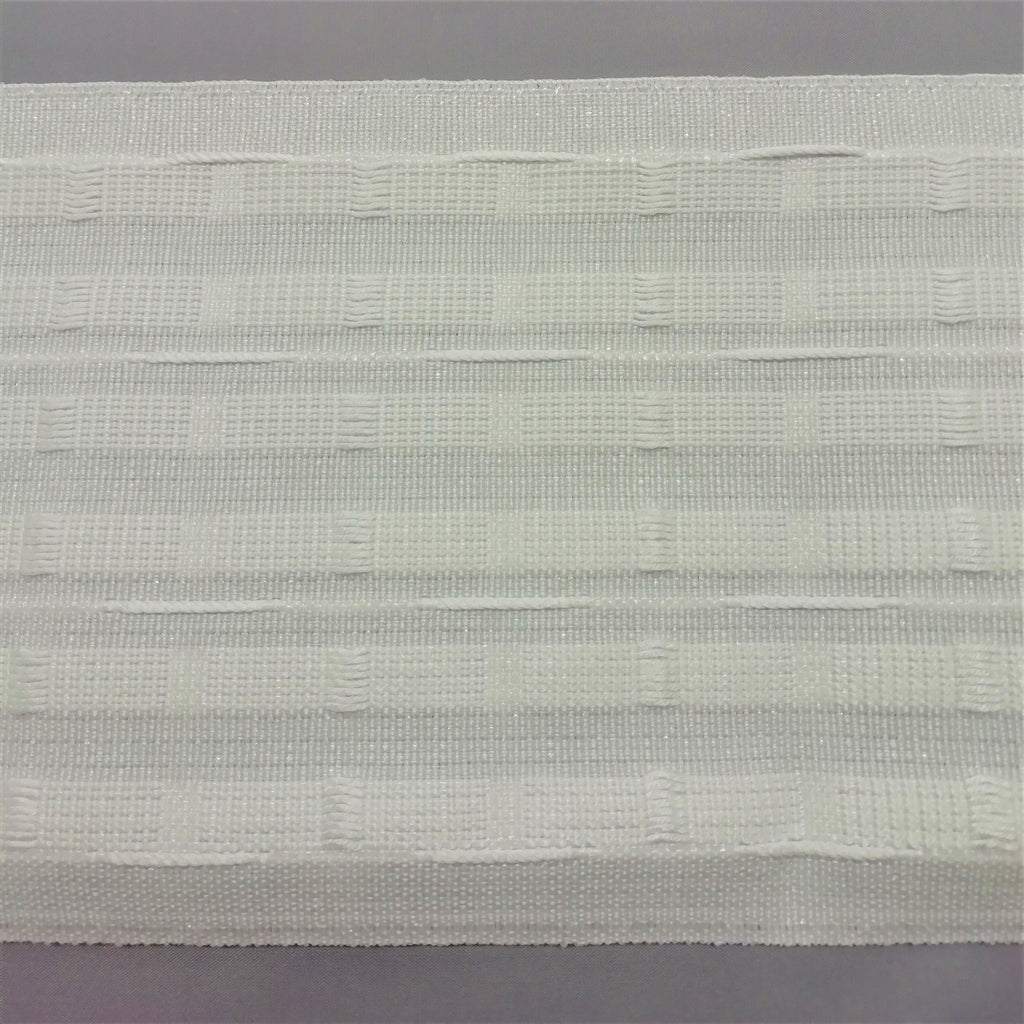 a close up of 6 inch pencil pleat curtain tape showing the corded pockets and drawcords
