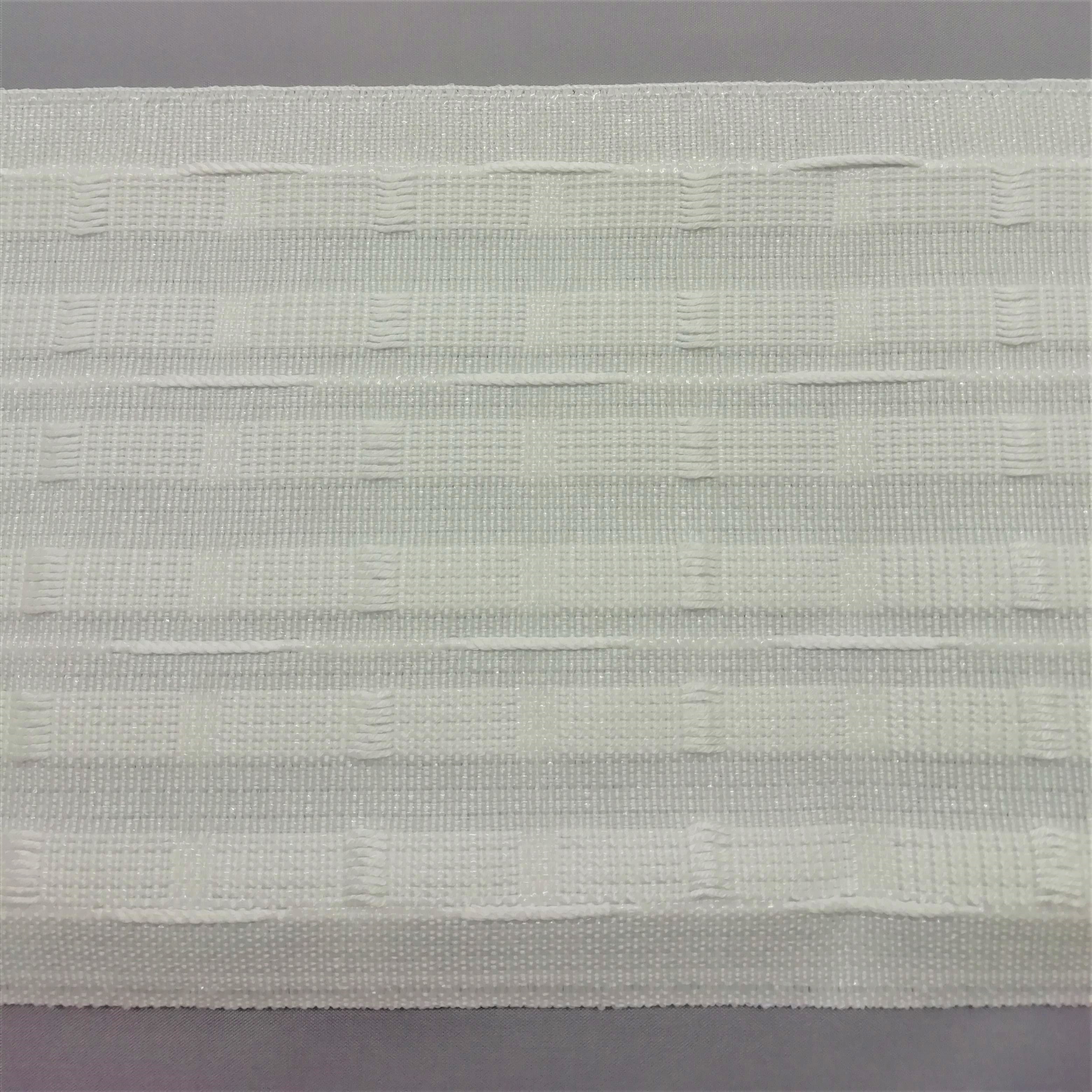 a close up of 6 inch pencil pleat curtain tape showing the corded pockets and drawcords