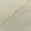 A close up of the two sides of brushed lining. One sateen one soft brushed