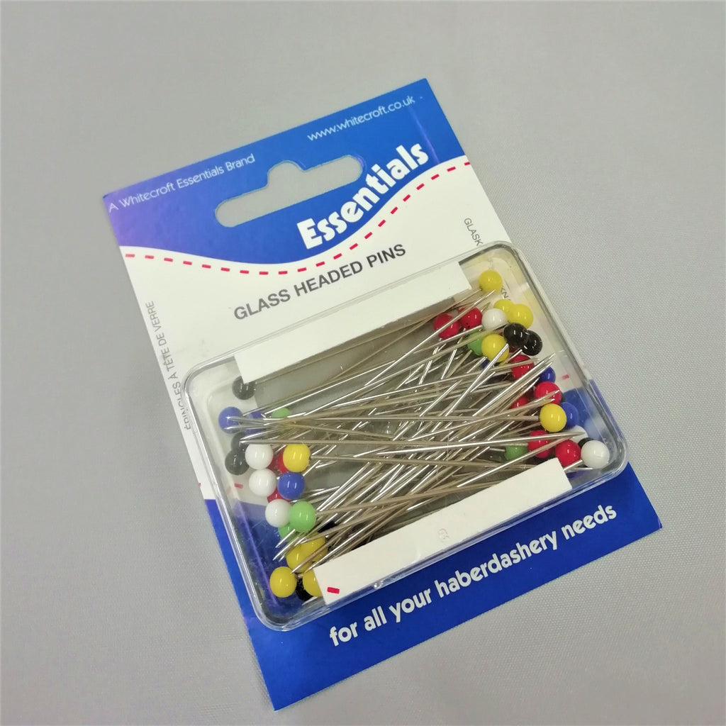 A box of extra large pins