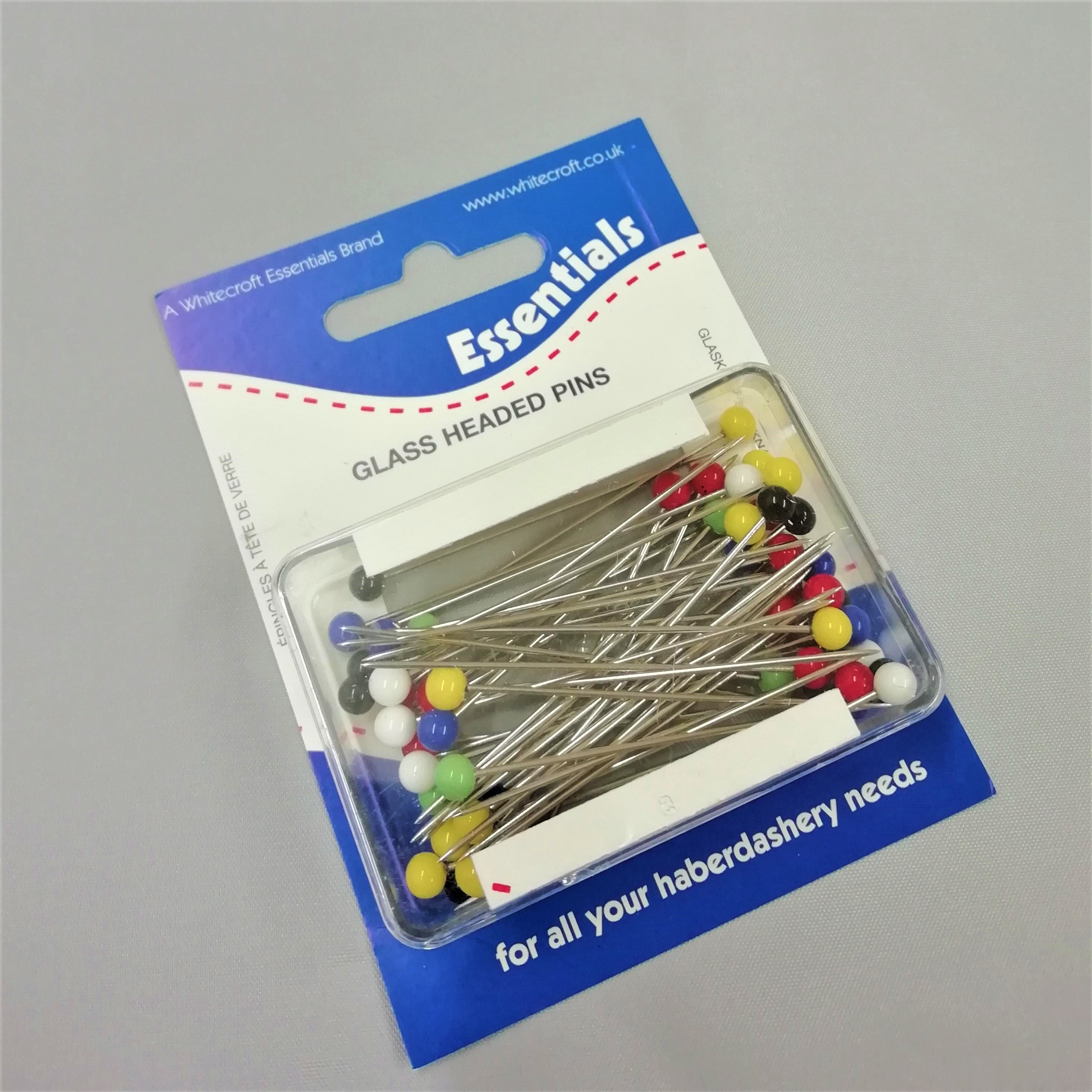 A box of extra large pins
