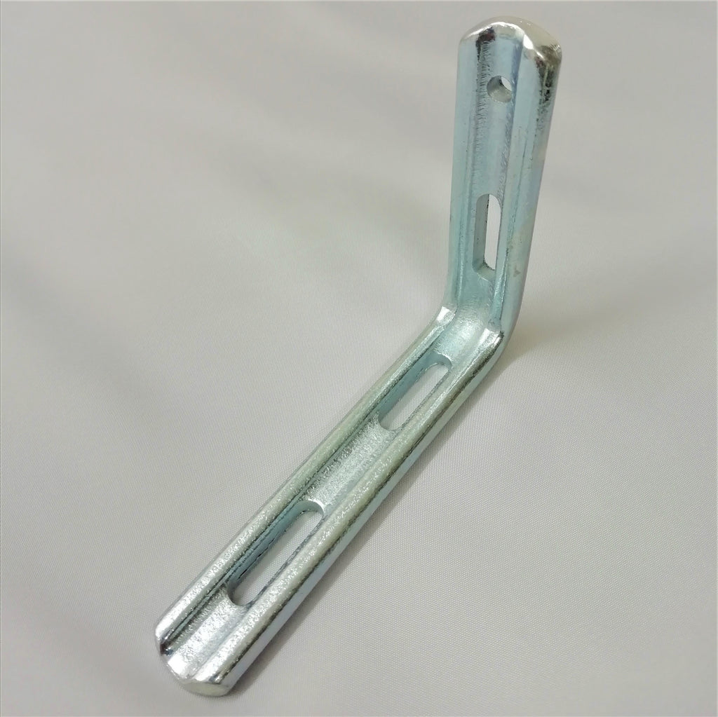 A steel l-shaped pelmet bracket on a gray background