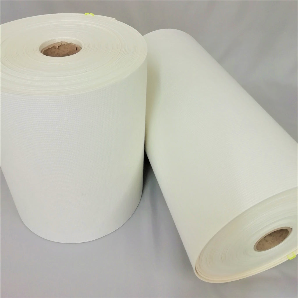 2 rolls of white pelmet buckram one 12 inches and the other 18 inches