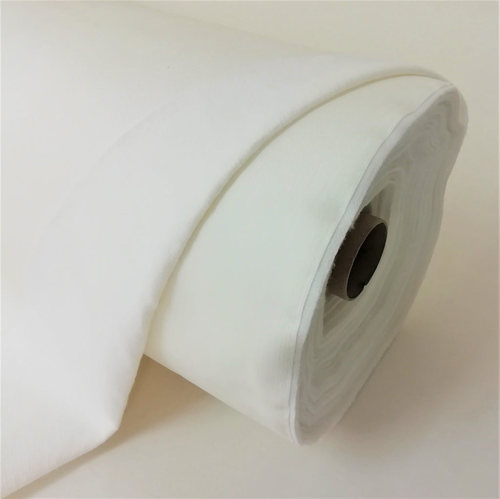 roll of bonded curtain lining. polycotton lining backed with polyester fleece