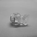 A clear plastic clip in cord stop for clipping onto the tape of roman blinds