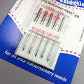 A close up of Leather point Sewing machine needles