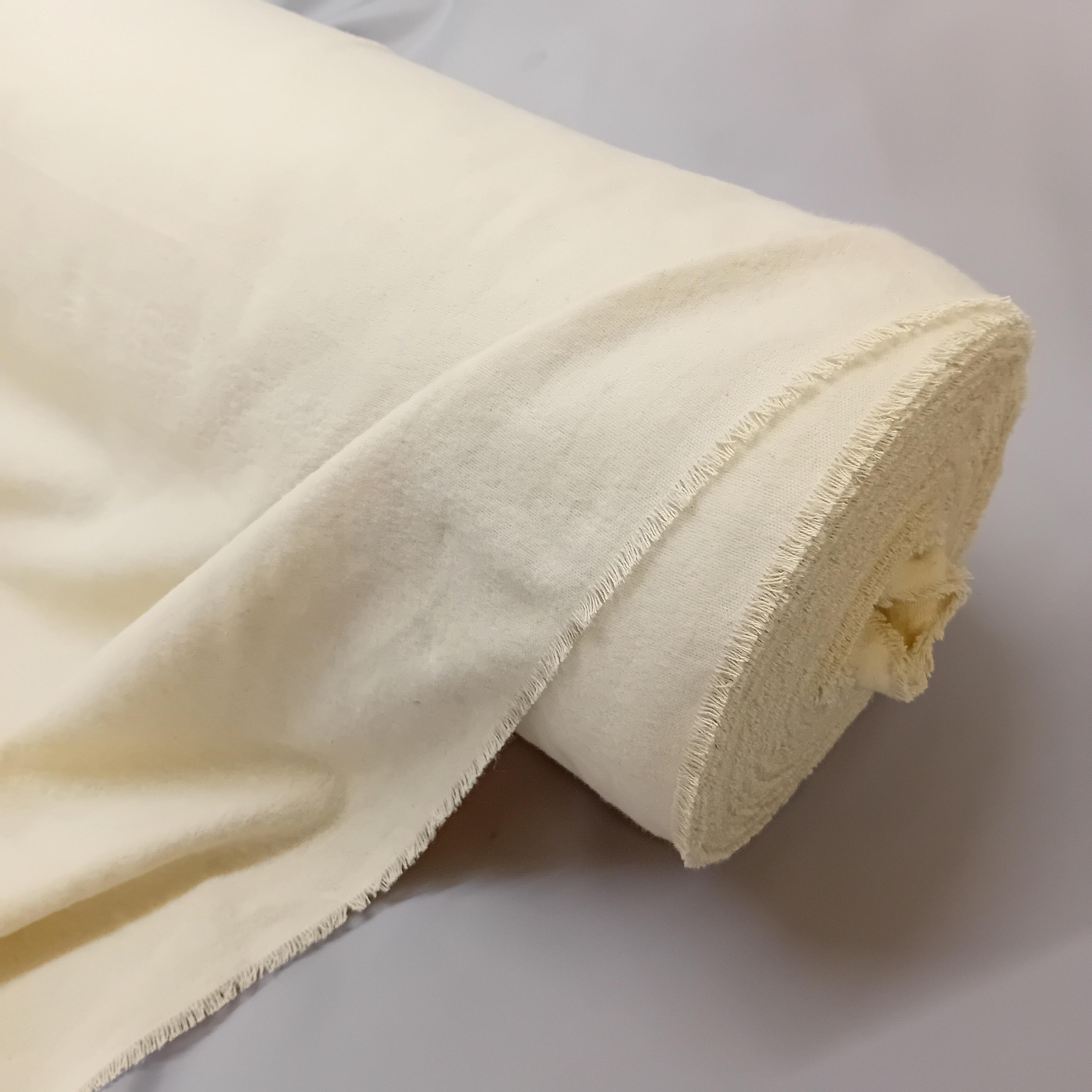 roll of light beige cotton curtain interlining