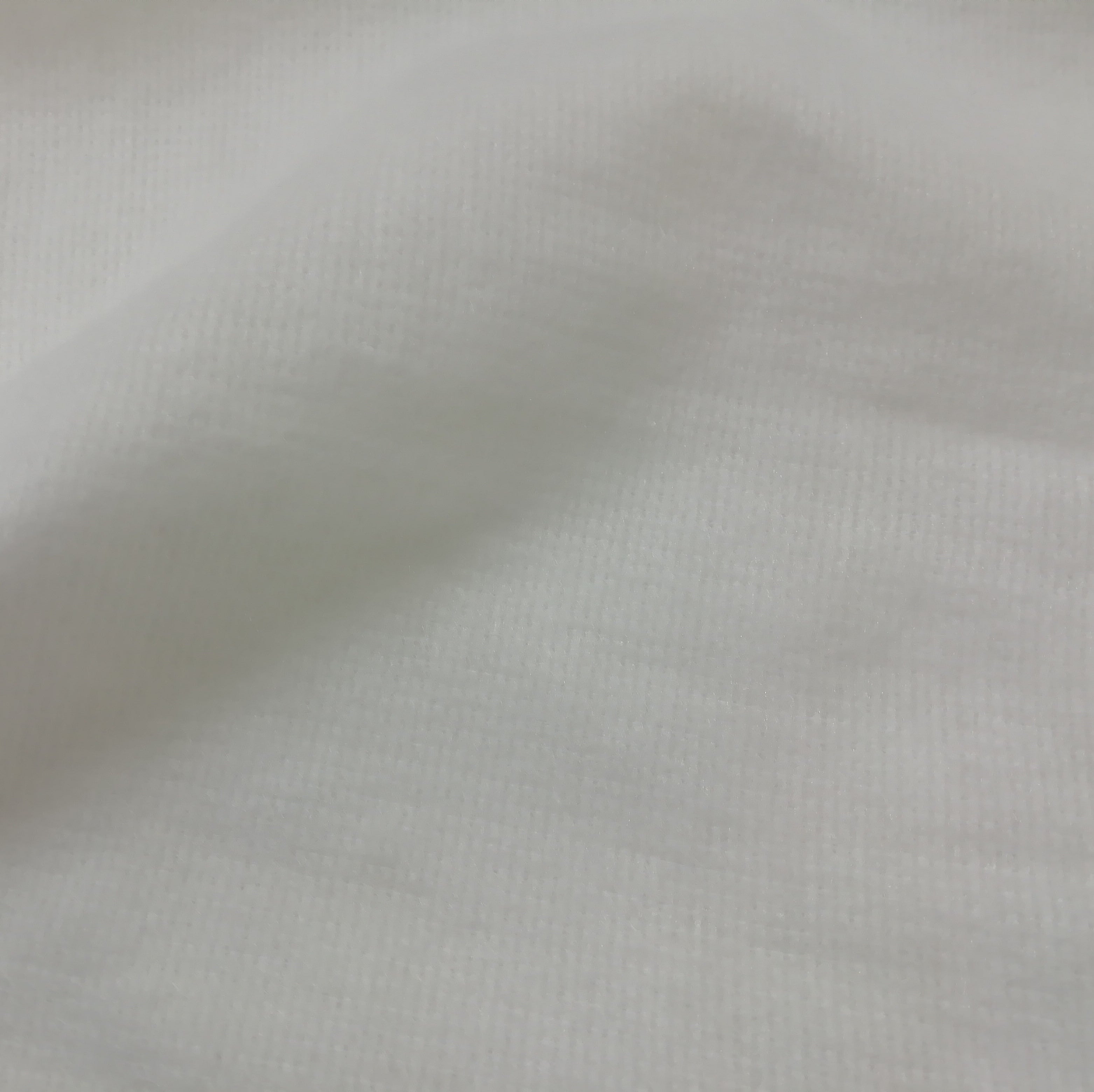 close up of white ployester curtain interlining