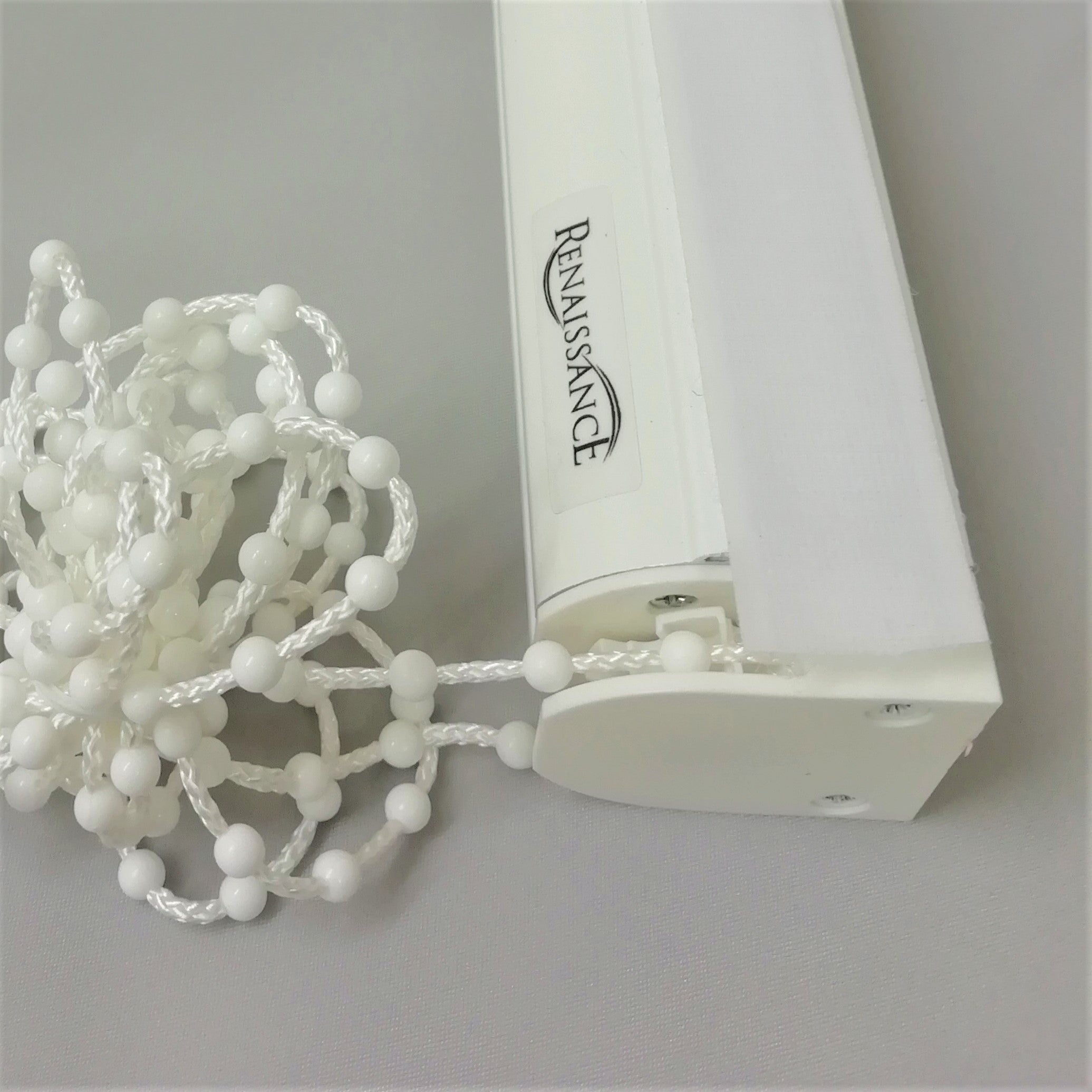 Roman blind chain system with white plastic chain