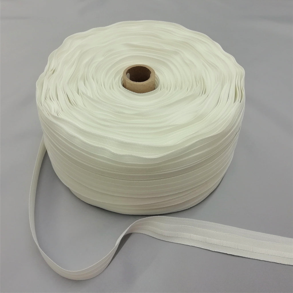 A roll of white roman blind tape