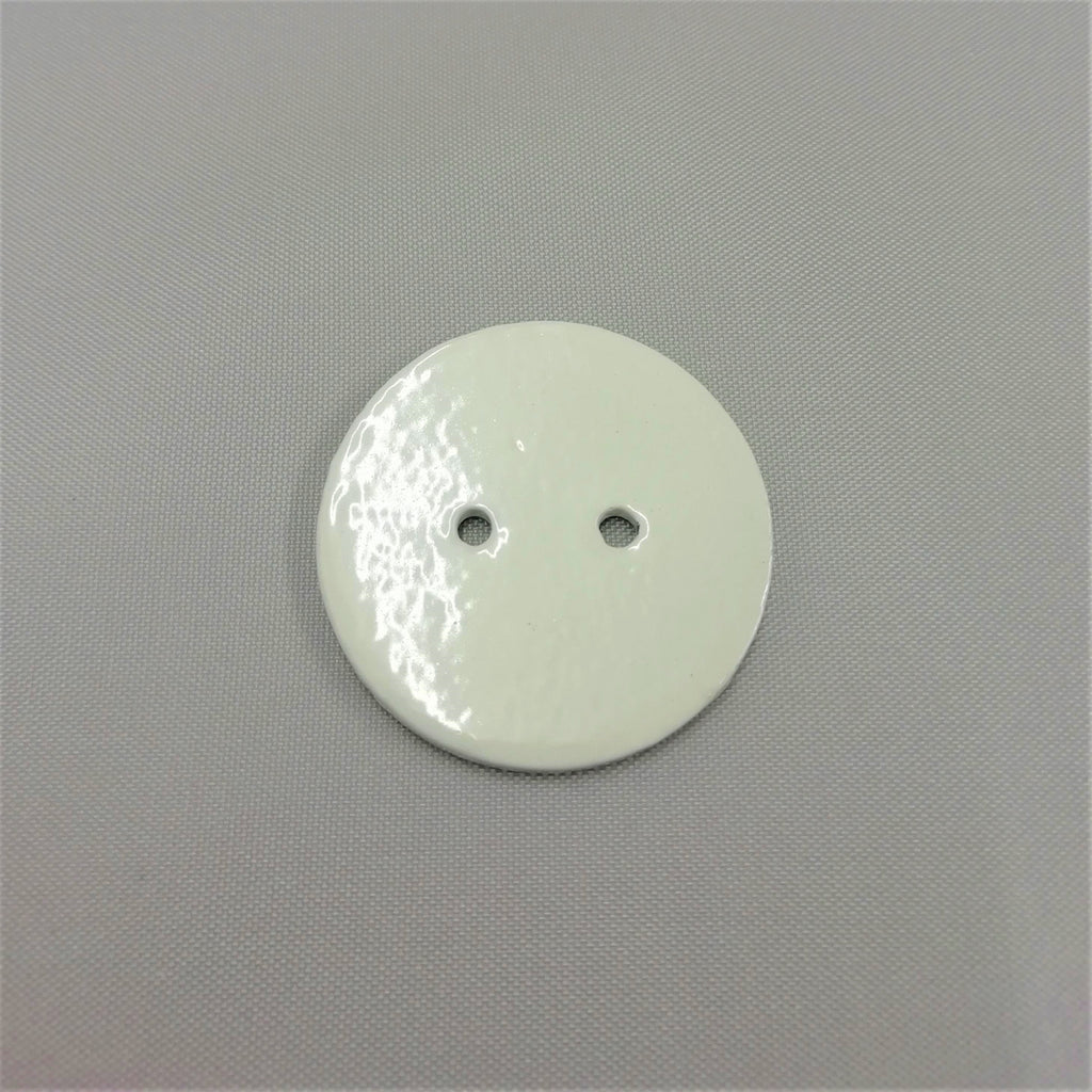 A white lead curtain weight