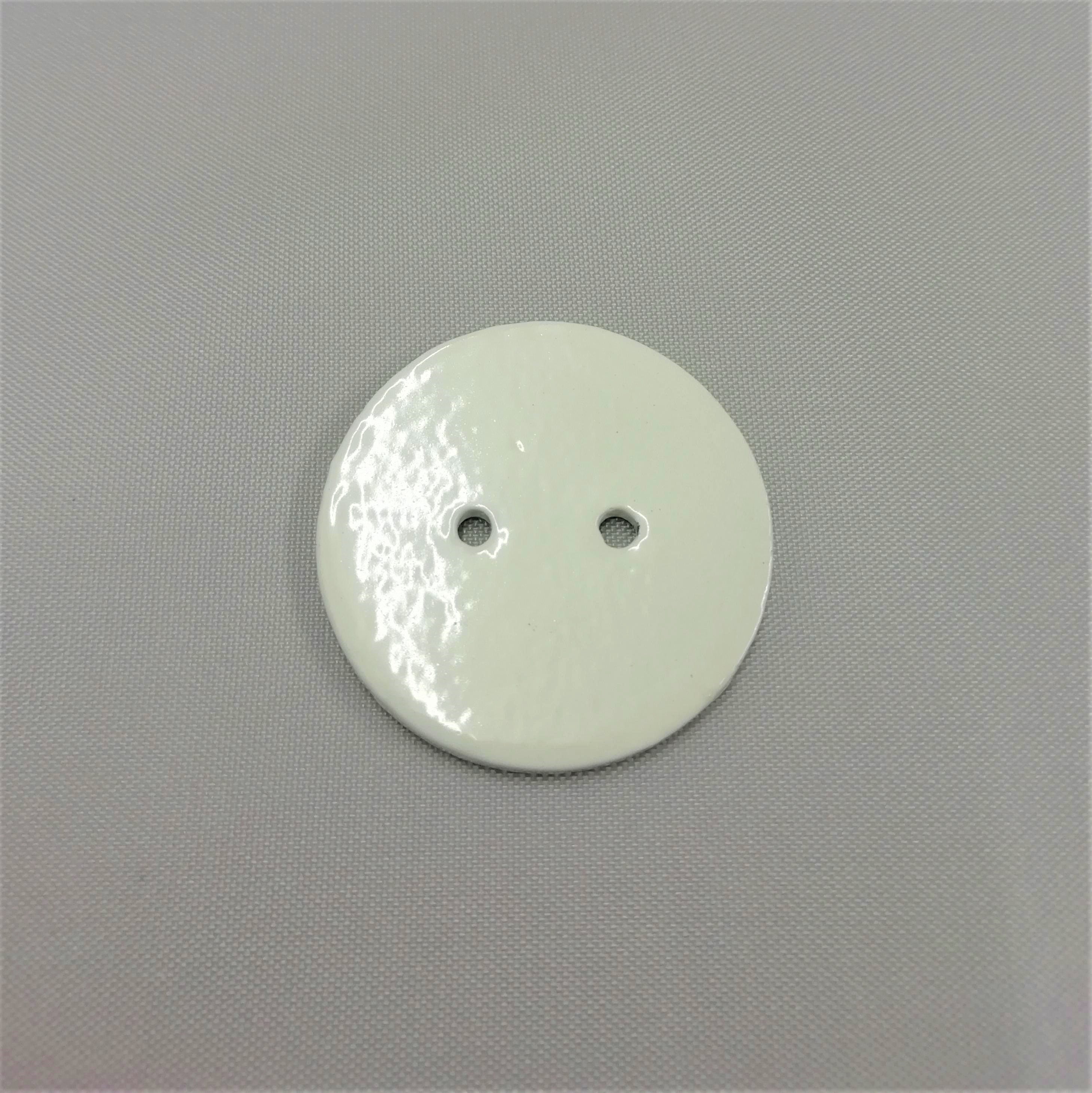 A white lead curtain weight